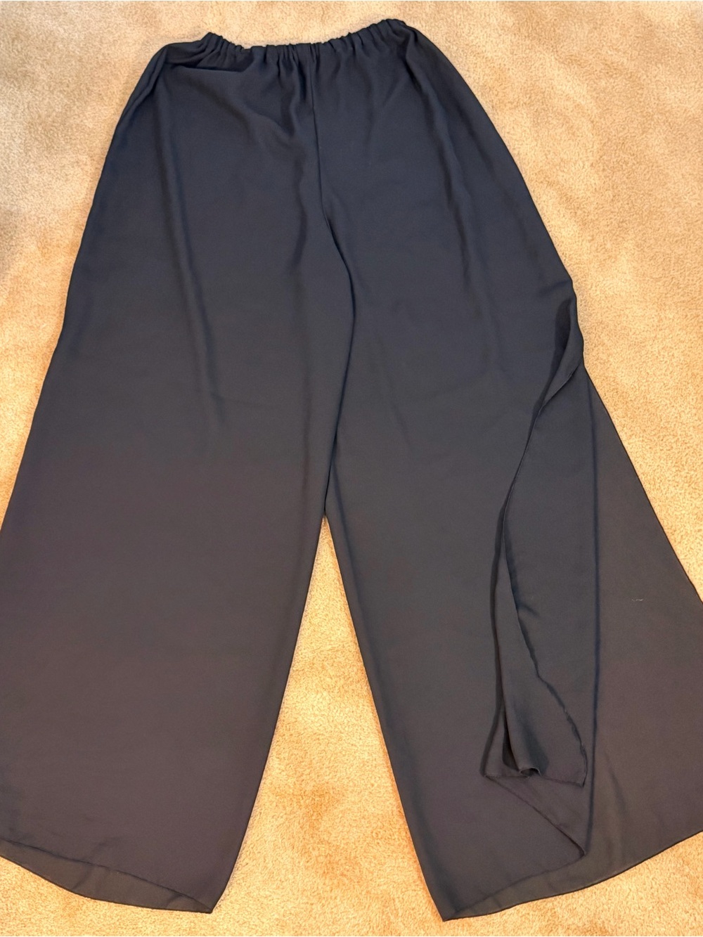 Women’s black sheer wide leg overlays pants.